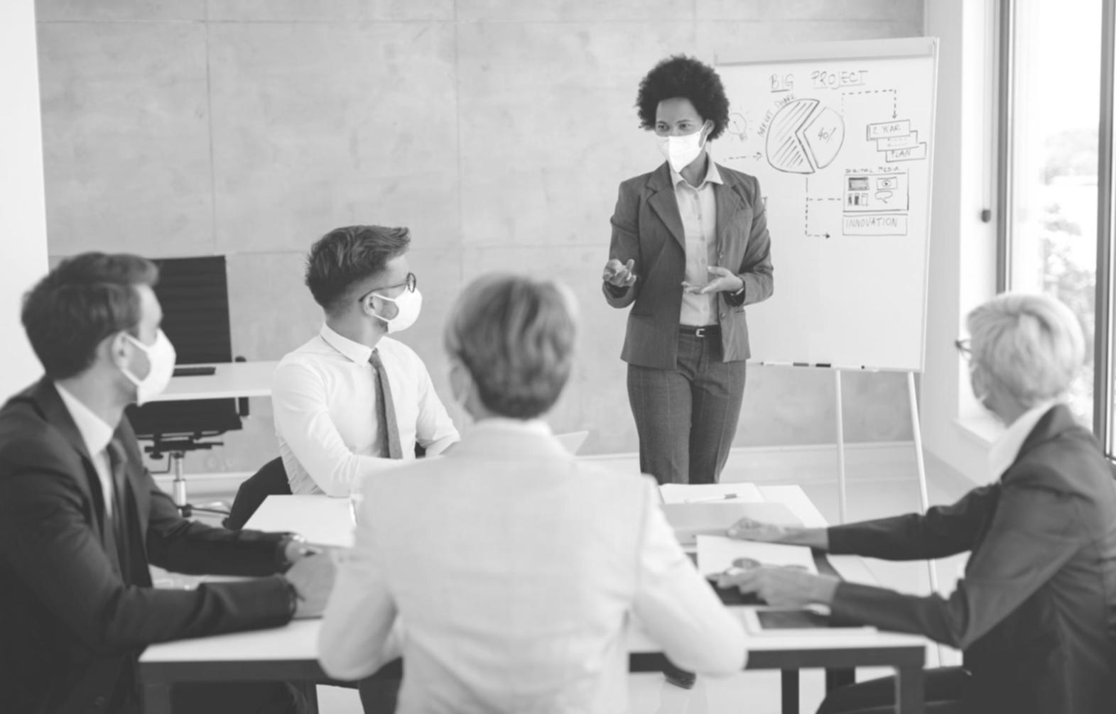 Software testing environment showing multiple monitors with code analysis and testing frameworks